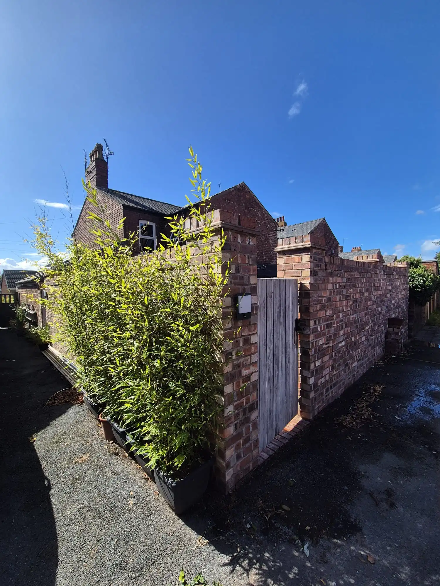 Completed garden wall with clean brick finish